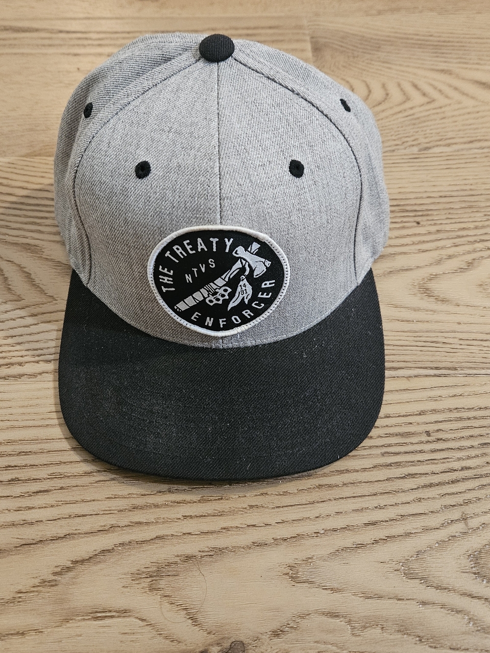 NTVS Gray and Black Snapback Hat with 'The Treaty Enforcer' Patch